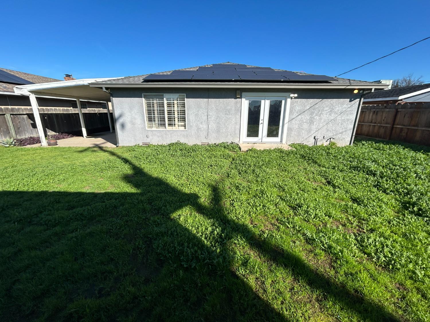 2581 Ballantyne Drive Merced, CA 95341 - Photo 16 of 16 a front view of a house with a garden