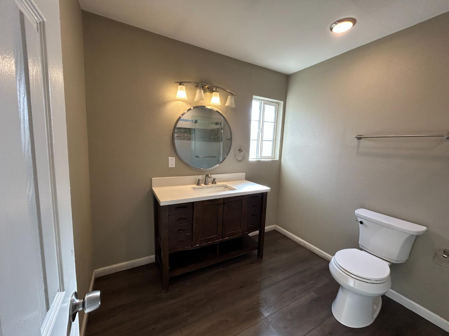 2581 Ballantyne Drive Merced, CA 95341 - Photo 6 of 16 a bathroom with a toilet a sink and mirror