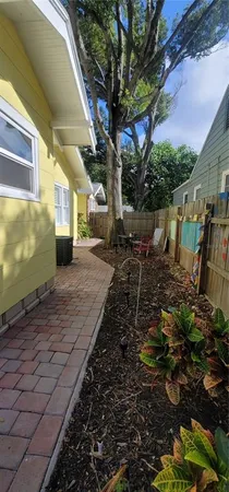 a view of a back yard of the house