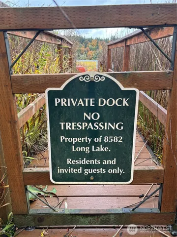 a view of swimming pool with a lake