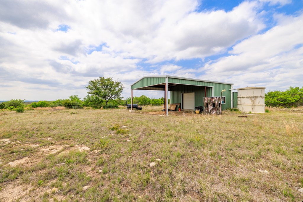 3276 Link Road Doss, TX 78618 - Photo 12 of 44 a front view of house with yard and lake view