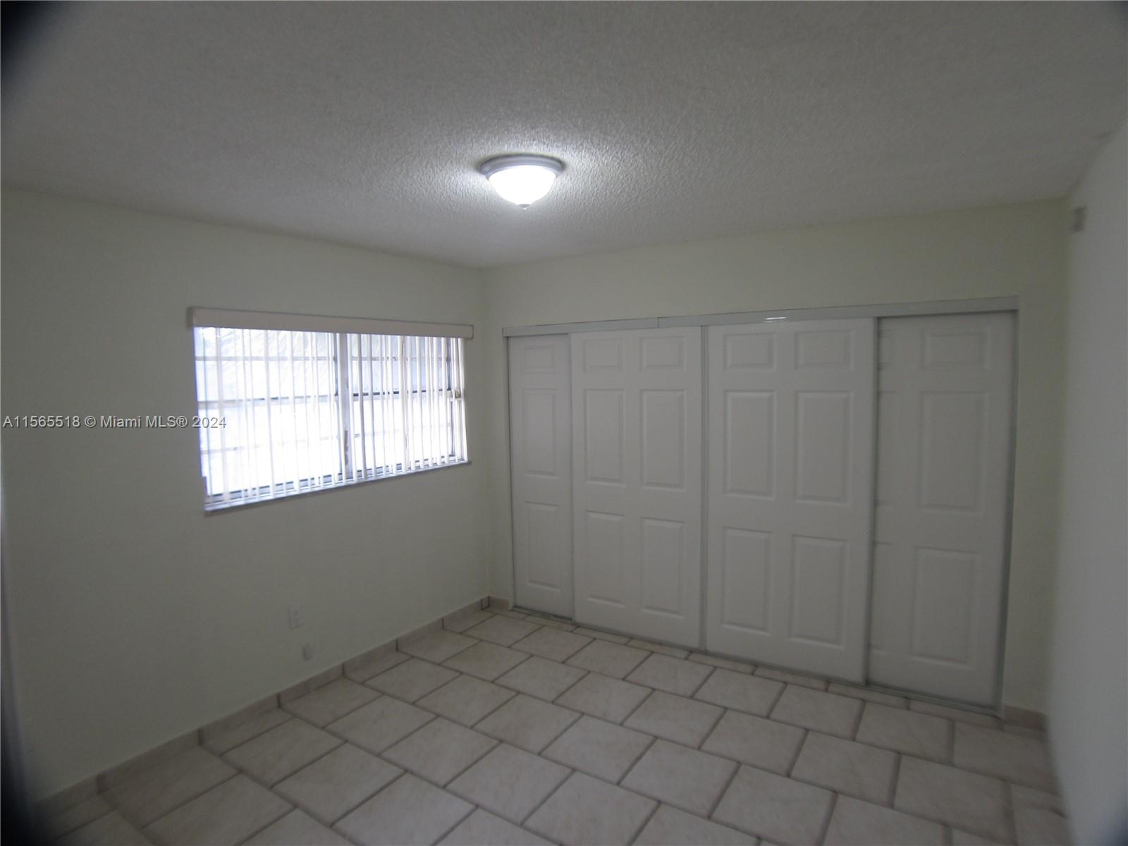 10 Southwest 108th Avenue, Unit E8 Sweetwater, FL 33174 - Photo 5 of 21