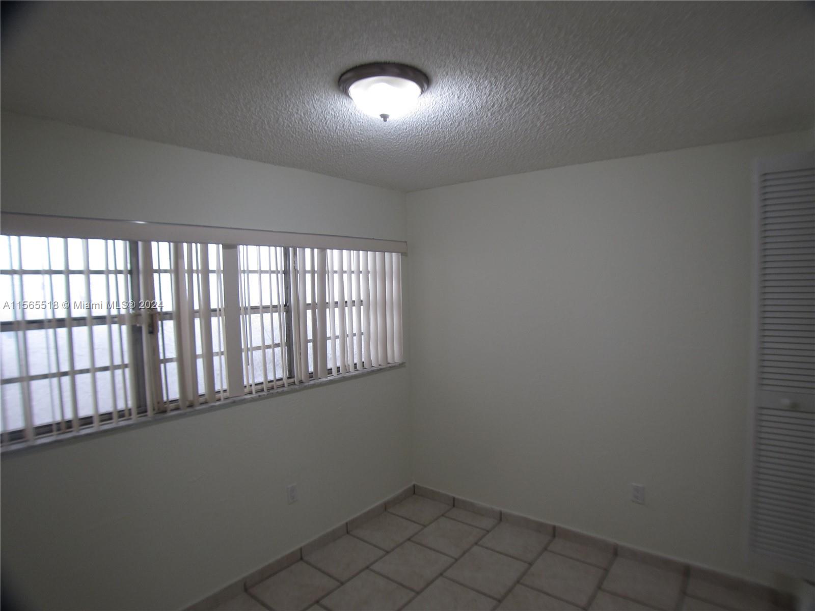 10 Southwest 108th Avenue, Unit E8 Sweetwater, FL 33174 - Photo 9 of 21