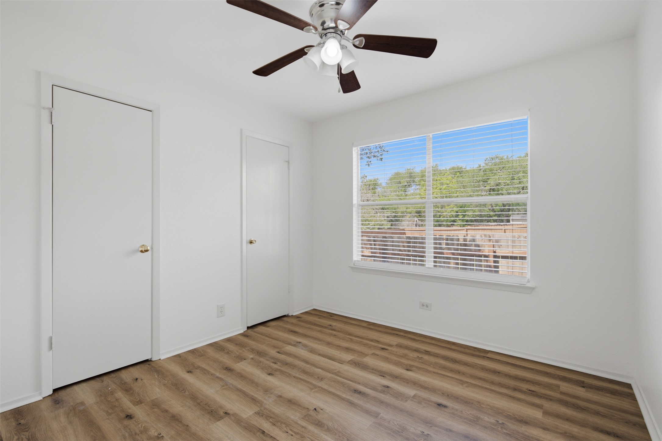 11611 Rustic Rock Drive, Unit B Austin, TX 78750 - Photo 20 of 30 Bedroom # 3 of 3, walk-in closet, ceiling fan