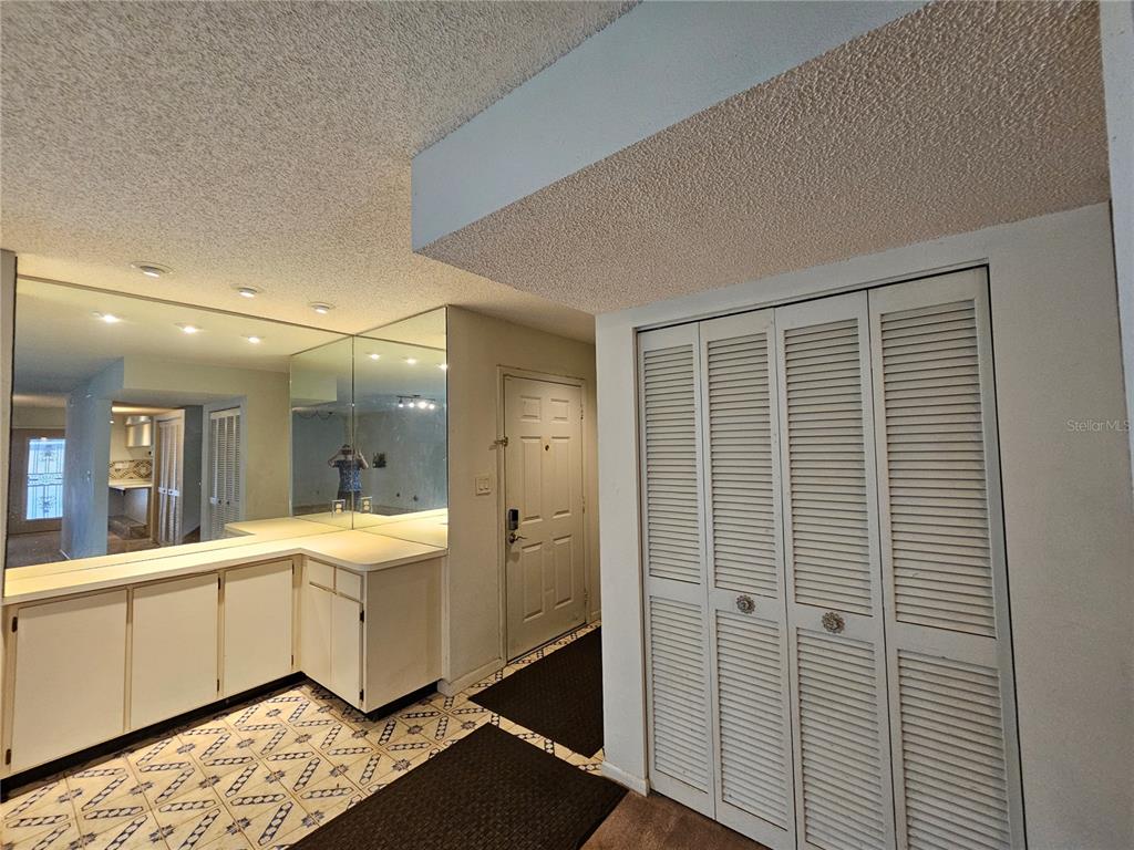 3418 West St Conrad Street Tampa, FL 33607 - Photo 2 of 24 a bathroom with a sink and a mirror
