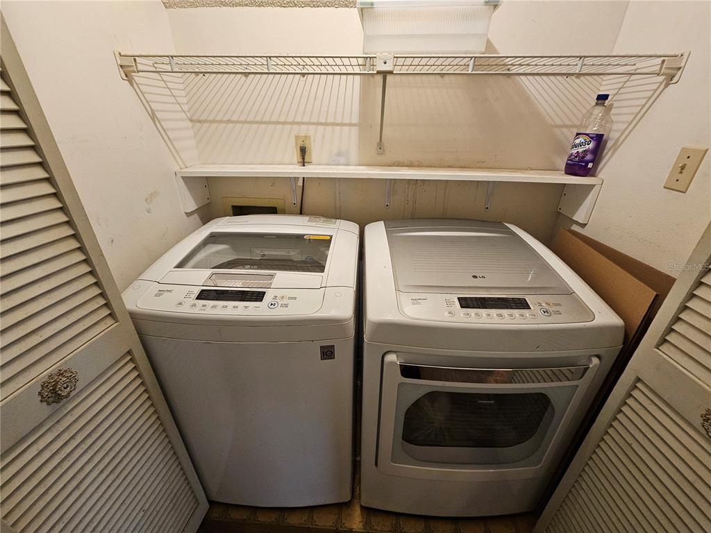 3418 West St Conrad Street Tampa, FL 33607 - Photo 9 of 24 a utility room with dryer and washer