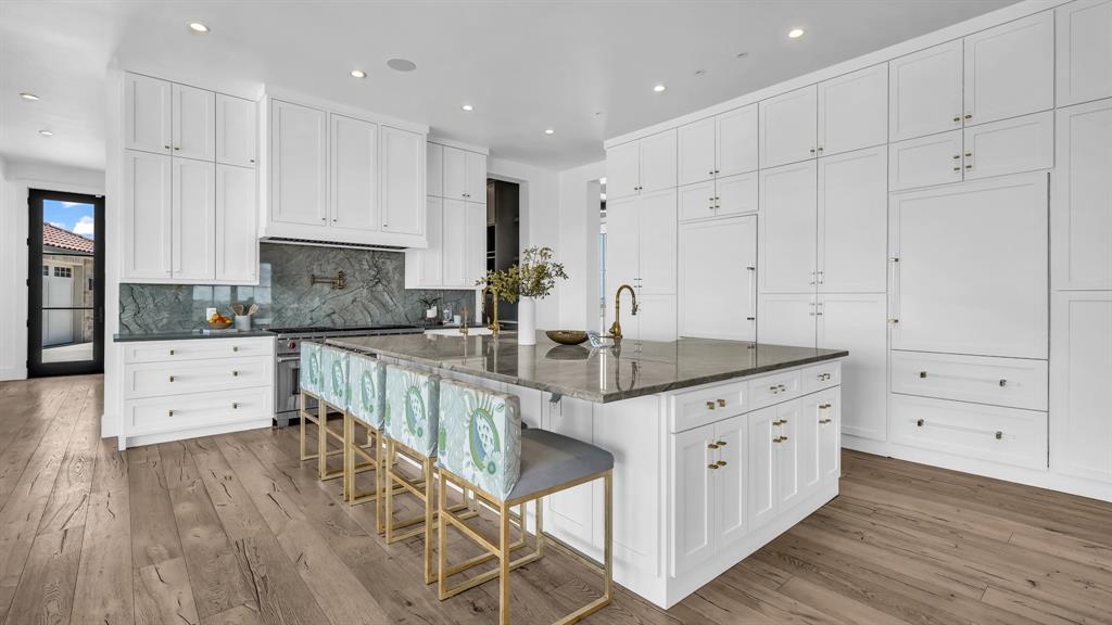 11802 East Rocky Creek Road Crowley, TX 76036 - Photo 12 of 40 a kitchen with granite countertop a sink a counter top space stainless steel appliances and cabinets