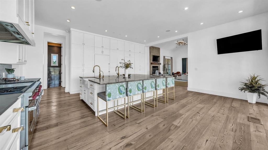 11802 East Rocky Creek Road Crowley, TX 76036 - Photo 13 of 40 a dining room with furniture and wooden floor