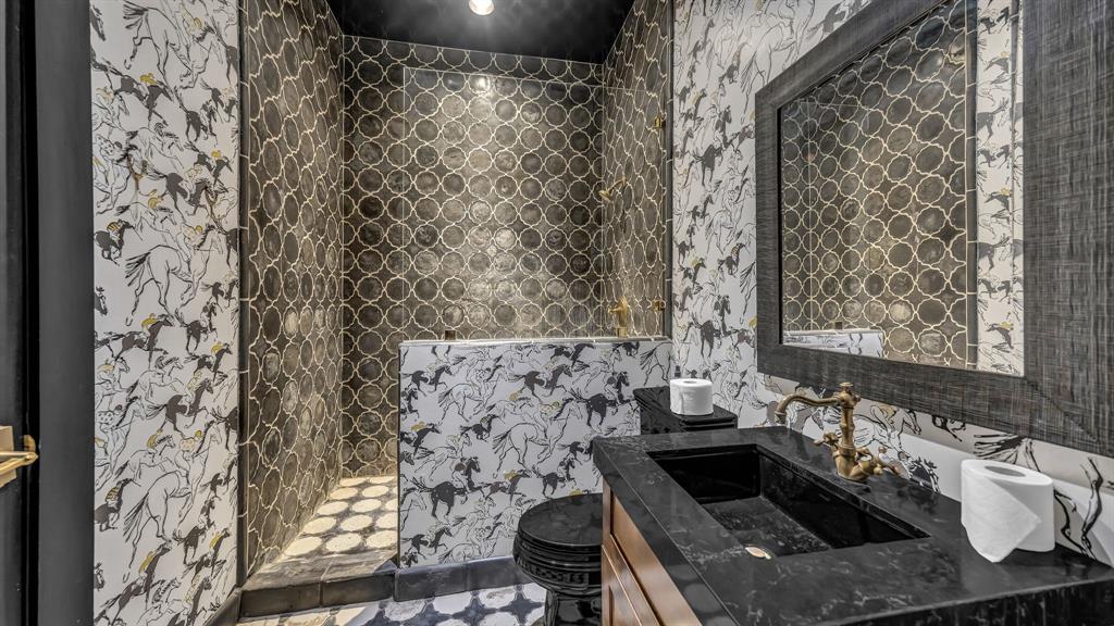 11802 East Rocky Creek Road Crowley, TX 76036 - Photo 36 of 40 a bathroom with a granite countertop sink a toilet and shower curtain