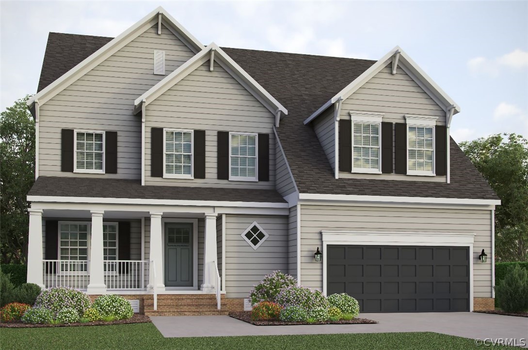 1602 Reed Marsh Place Goochland, VA 23063 - Photo 1 of 41 a front view of a house with a garden and plants