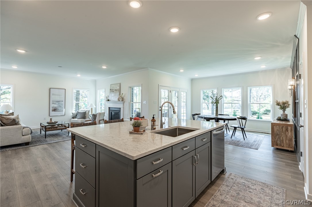 1602 Reed Marsh Place Goochland, VA 23063 - Photo 14 of 41 a large kitchen with kitchen island a sink table and chairs