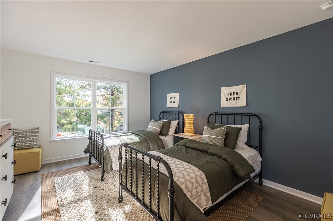 1602 Reed Marsh Place Goochland, VA 23063 - Photo 25 of 41 a bedroom with two beds and a large window