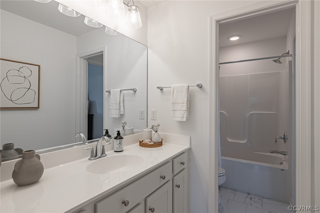 1602 Reed Marsh Place Goochland, VA 23063 - Photo 35 of 41 a bathroom with a tub sink and mirror