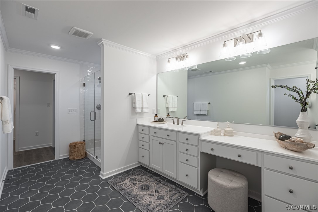 1602 Reed Marsh Place Goochland, VA 23063 - Photo 39 of 41 a spacious bathroom with a double vanity sink a mirror and a