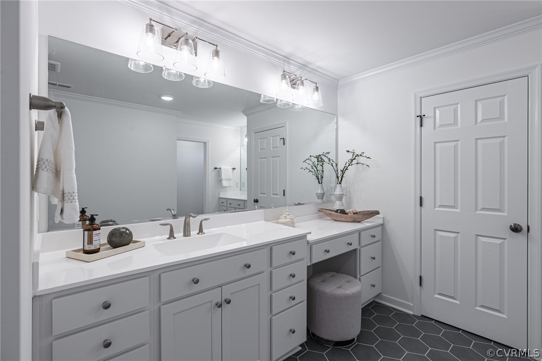 1602 Reed Marsh Place Goochland, VA 23063 - Photo 40 of 41 a bathroom with a double vanity sink and a mirror