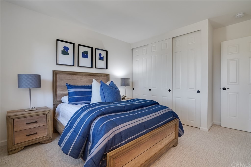 1988 Timberlane Way San Mateo, CA 94402 - Photo 16 of 36 a bedroom with a bed and a lamp