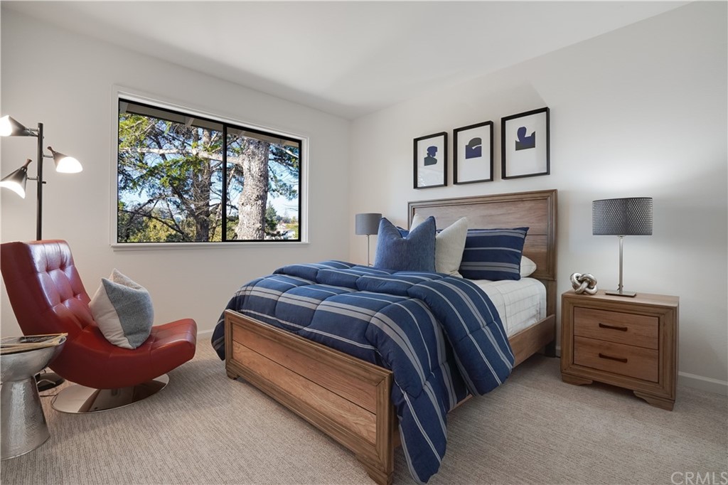 1988 Timberlane Way San Mateo, CA 94402 - Photo 17 of 36 a bedroom with a bed and a large window