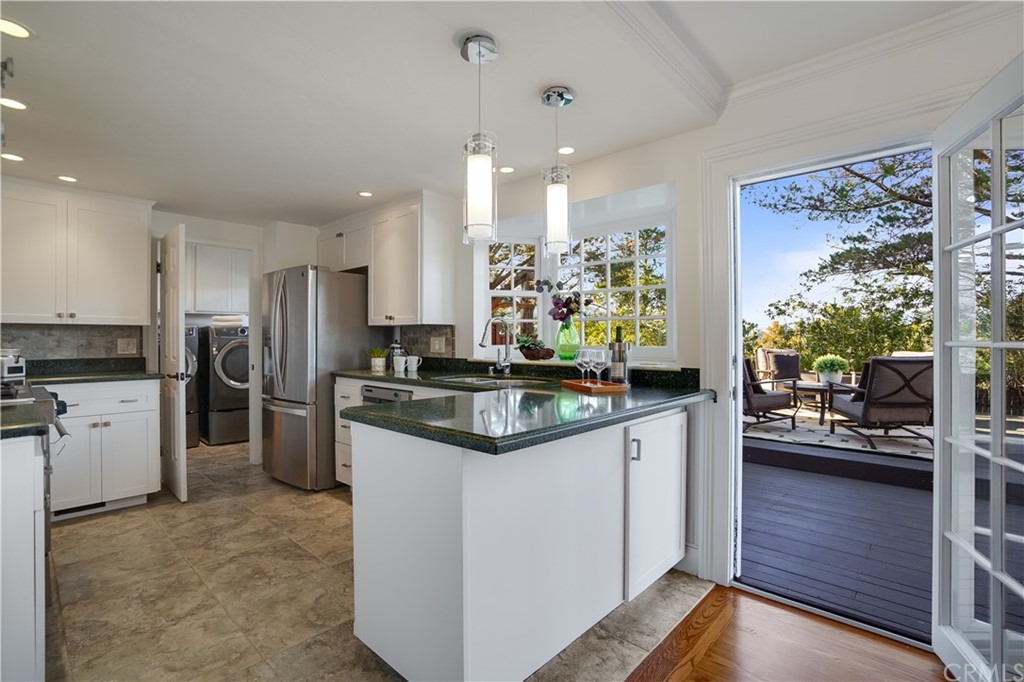 1988 Timberlane Way San Mateo, CA 94402 - Photo 30 of 36 a kitchen with a sink stove and refrigerator