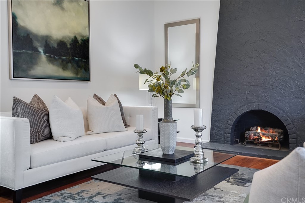 1988 Timberlane Way San Mateo, CA 94402 - Photo 4 of 36 a living room with furniture and a fireplace