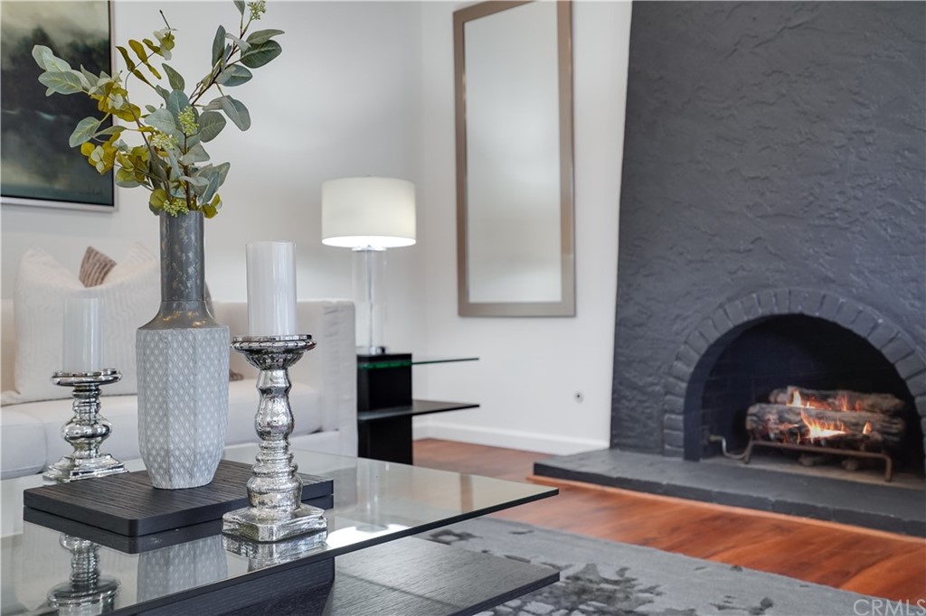 1988 Timberlane Way San Mateo, CA 94402 - Photo 5 of 36 a living room with furniture and a fireplace