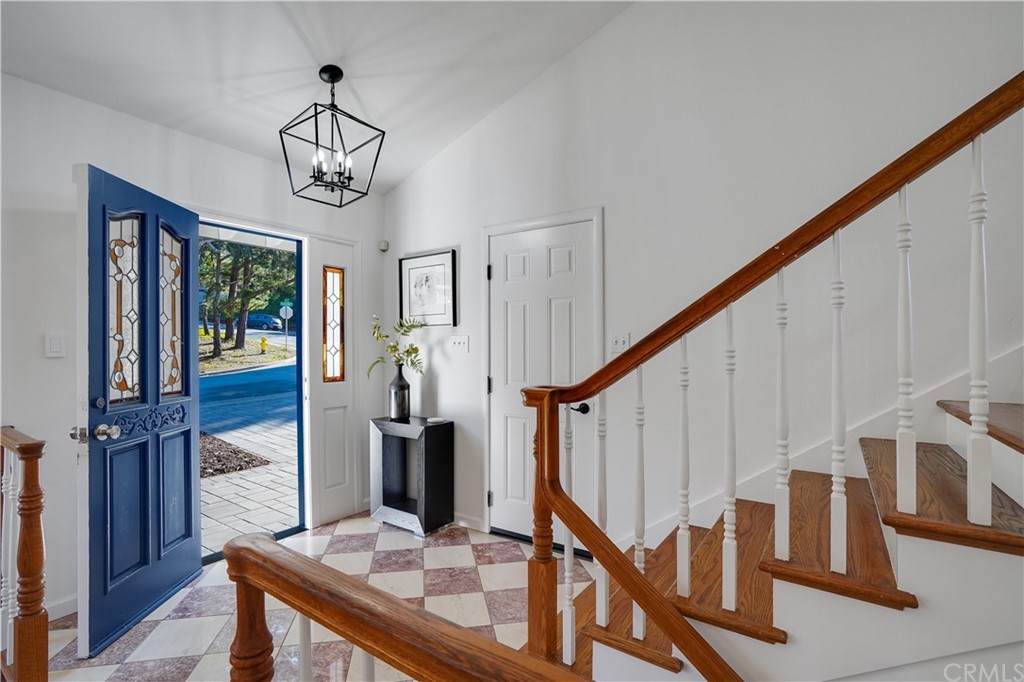 1988 Timberlane Way San Mateo, CA 94402 - Photo 7 of 36 a view of an entryway wooden floor and chandelier