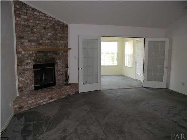 849 Copper Ridge Drive Cantonment, FL 32533 - Photo 7 of 13 Great Room with Corner Brick Fireplace