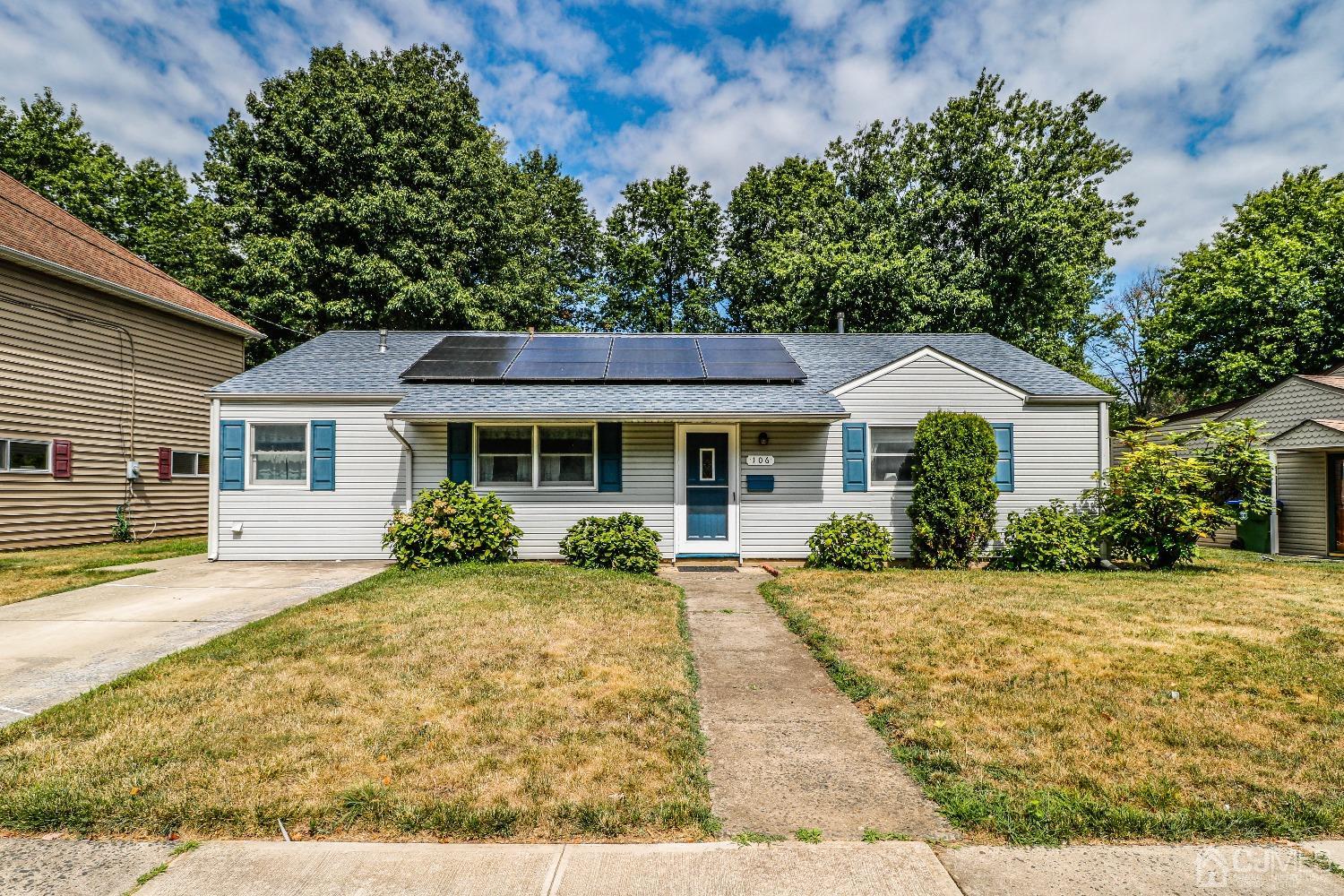 106 Winthrop Road Edison, NJ 08817 - Photo 1 of 38 a front view of a house with a yard