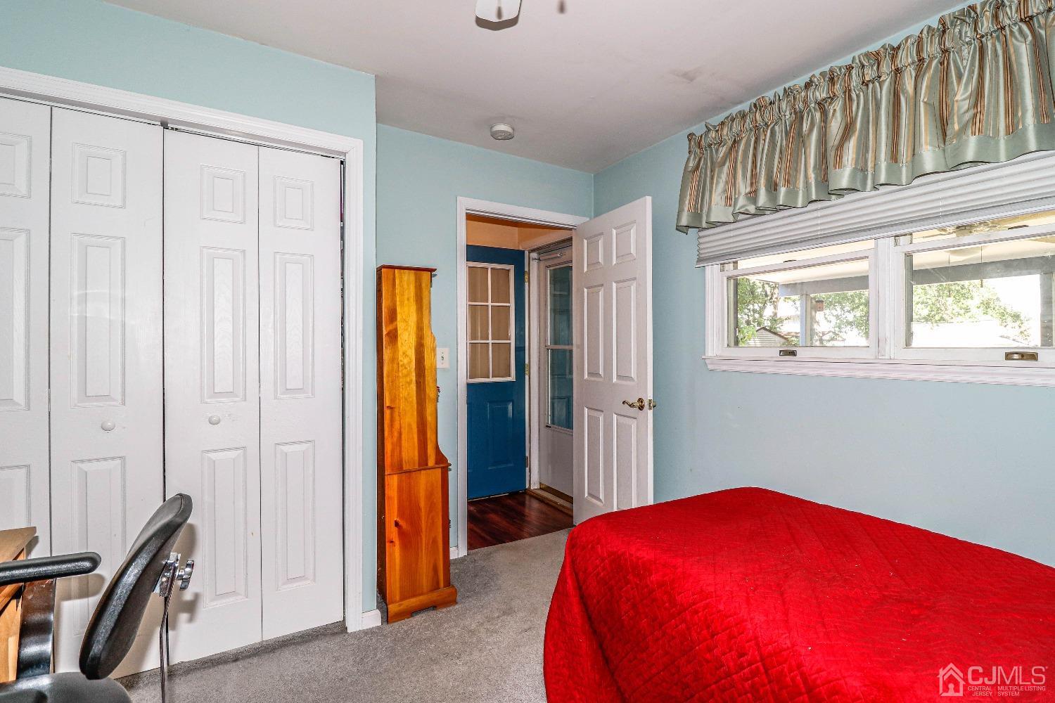 106 Winthrop Road Edison, NJ 08817 - Photo 24 of 38 a bedroom with a bed and a window