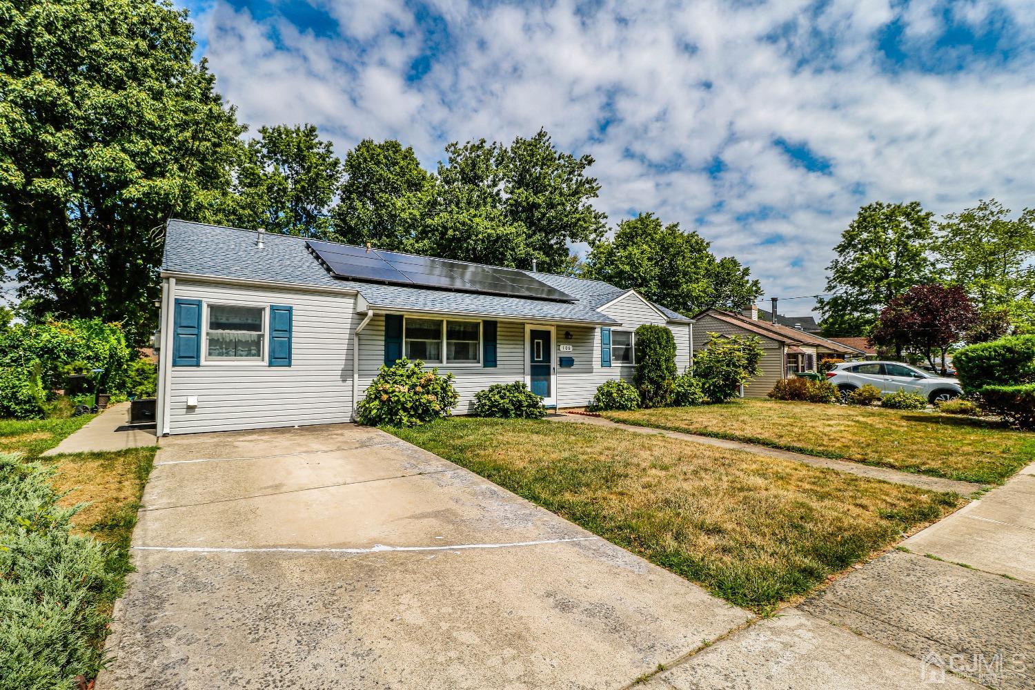 106 Winthrop Road Edison, NJ 08817 - Photo 3 of 38 a front view of a house with a yard
