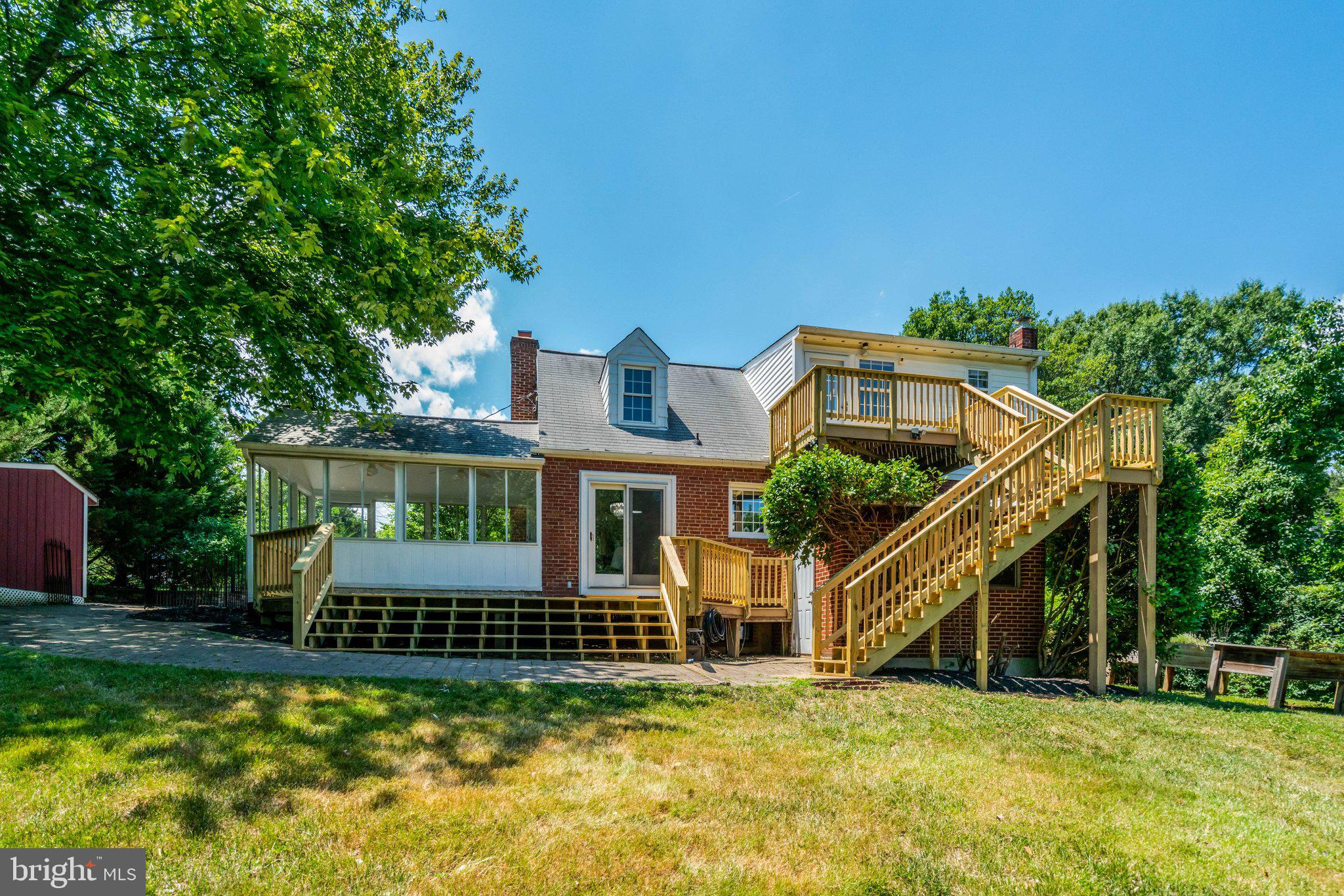 7107 Coventry Road Alexandria, VA 22306 - Photo 57 of 64 Backyard view of deck and home