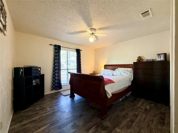 a view of living room with furniture and gym equipment