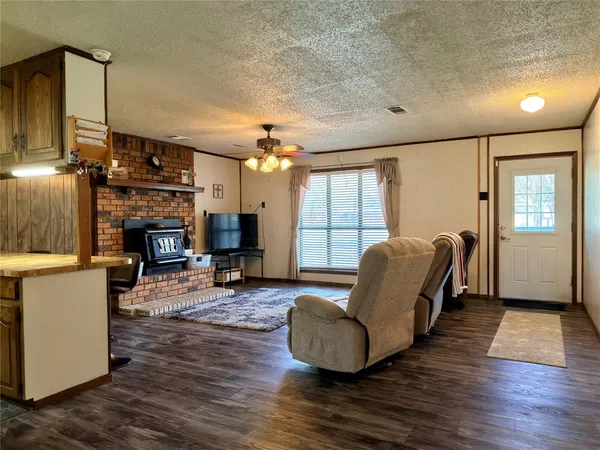 a living room with furniture and a table