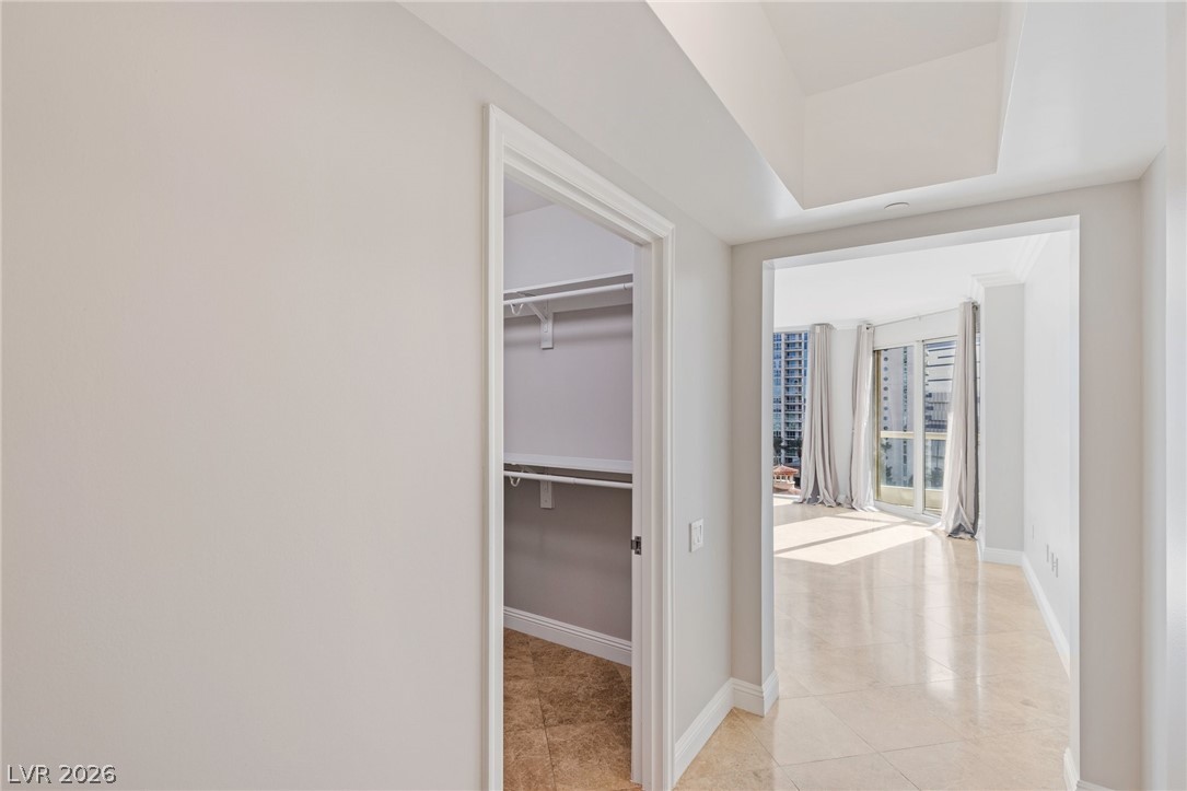 2777 Paradise Road, Unit 901 Las Vegas, NV 89109 - Photo 8 of 27 Hallway featuring baseboards and light tile patterned floors