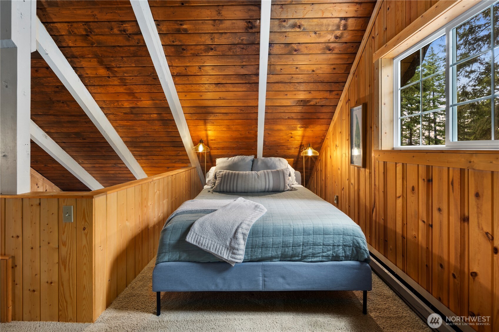 61 Hideaway Lane Ronald, WA 98940 - Photo 15 of 30 a bedroom with a bed and wooden floor