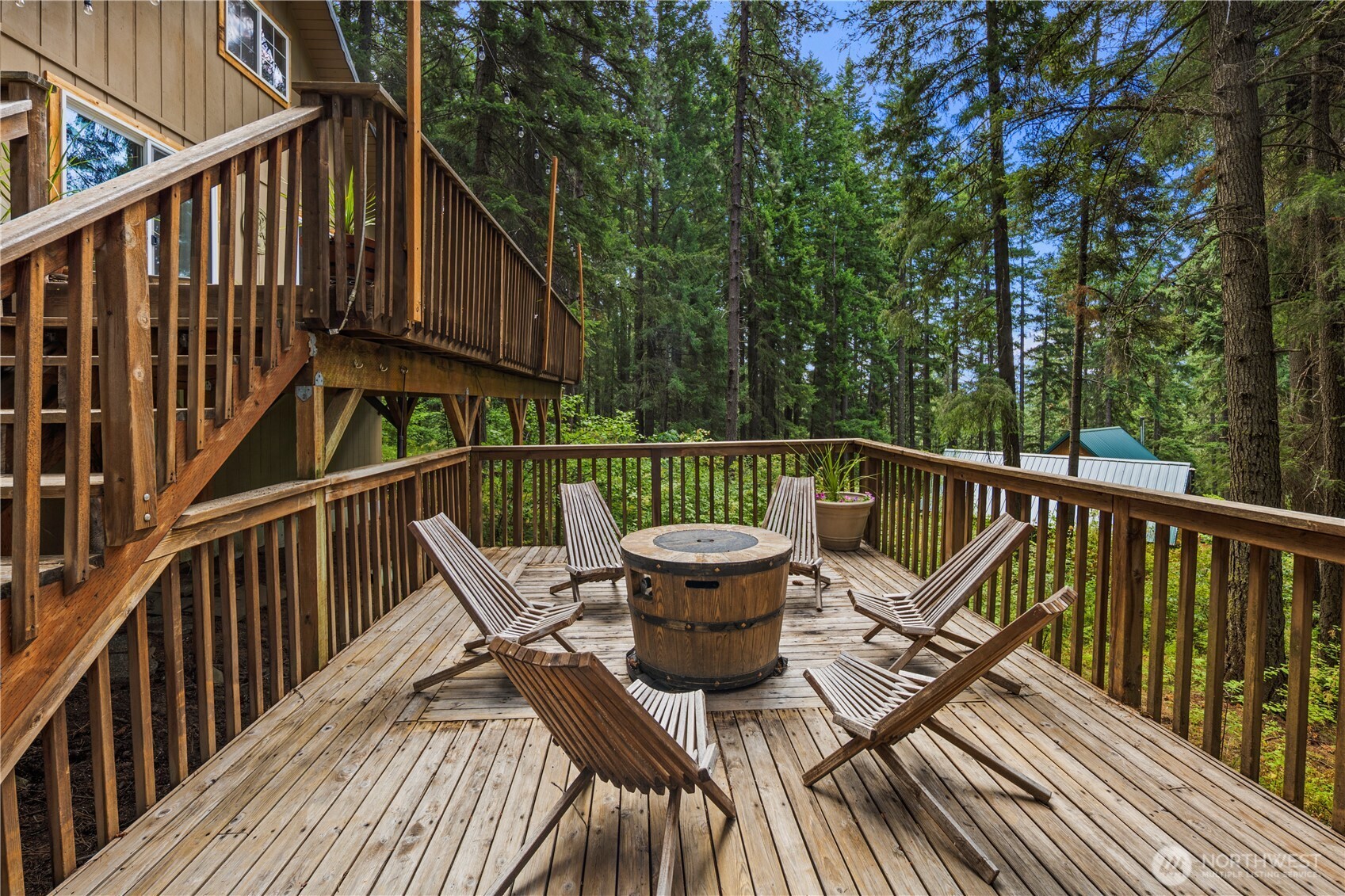 61 Hideaway Lane Ronald, WA 98940 - Photo 23 of 30 a view of a deck with two chair and wooden floor