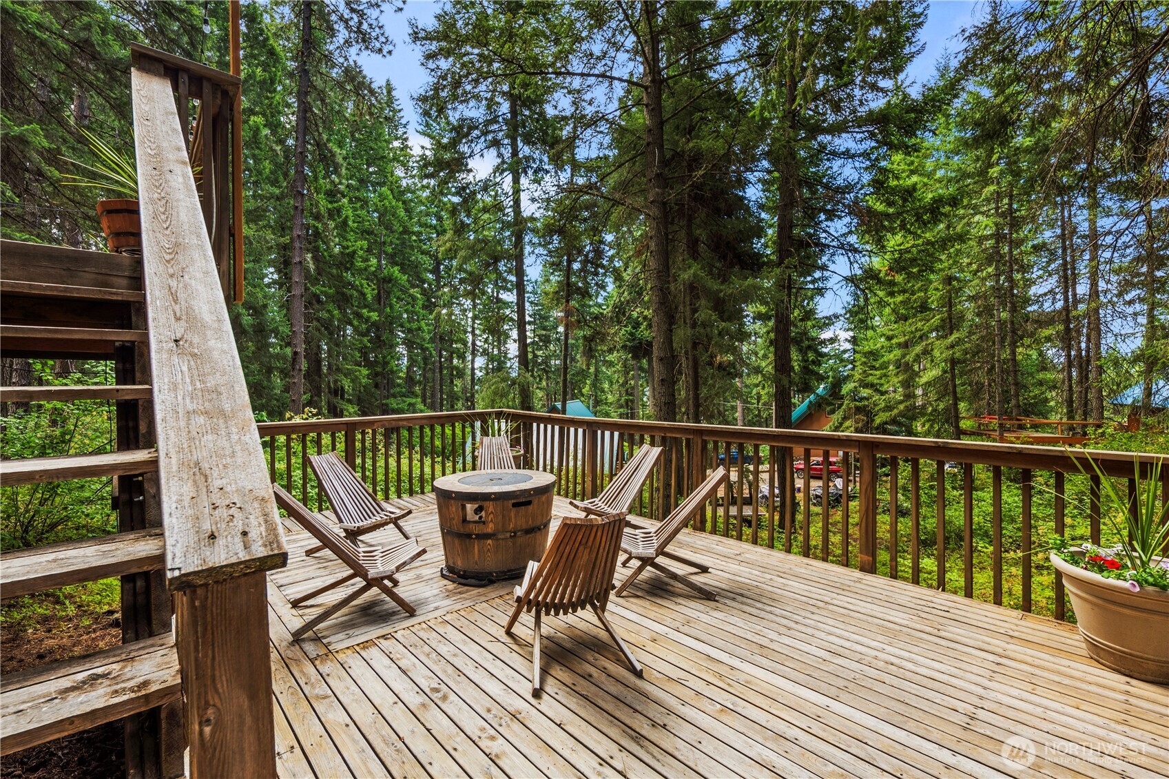 61 Hideaway Lane Ronald, WA 98940 - Photo 24 of 30 a view of a deck with two chair and wooden floor