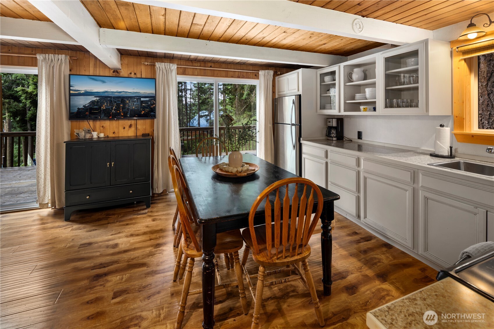 61 Hideaway Lane Ronald, WA 98940 - Photo 4 of 30 a kitchen with stainless steel appliances granite countertop a table chairs and a wooden floor