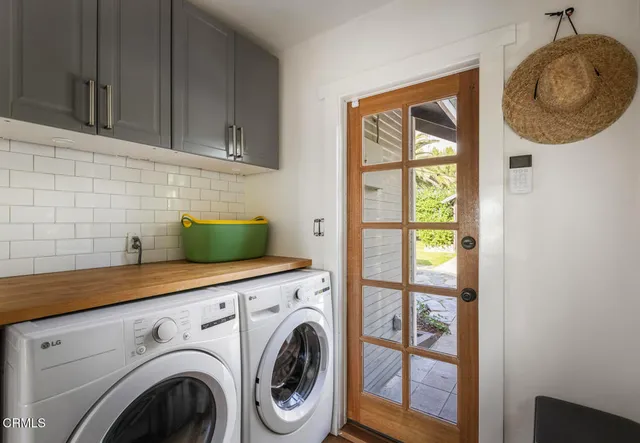 a utility room with dryer and washer