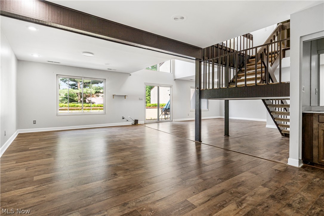 3428 South Smith Road Fairlawn, OH 44333 - Photo 23 of 30 Unfurnished living room with dark hardwood / wood-style flooring