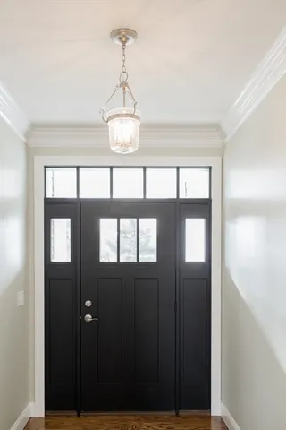 a view of a hallway with windows