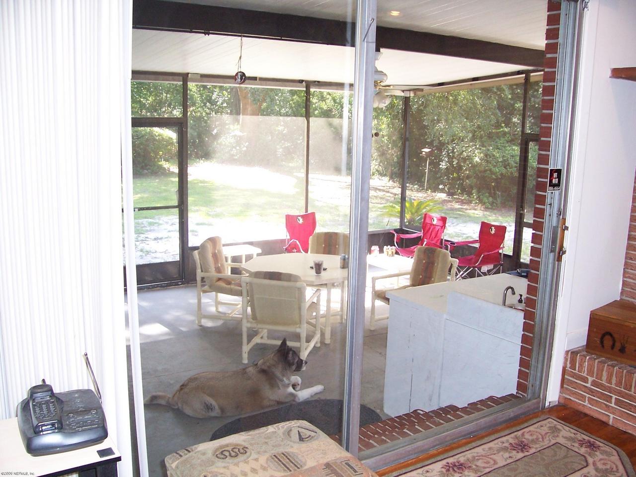 1929 Mill Creek Road Jacksonville, FL 32277 - Photo 9 of 13 Screened Lanai
