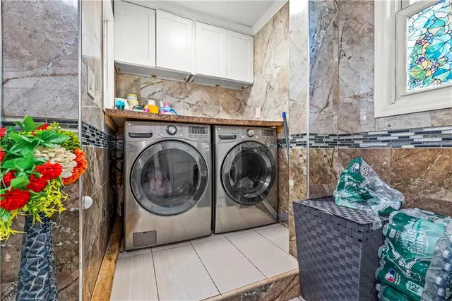 a utility room with a washer and dryer