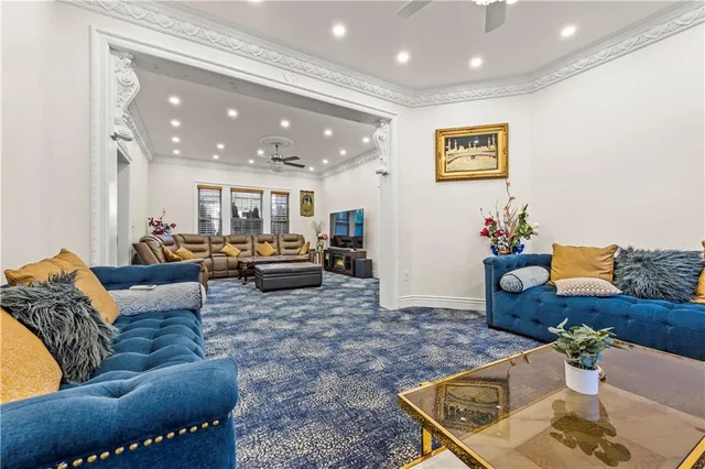 a living room with furniture and a table