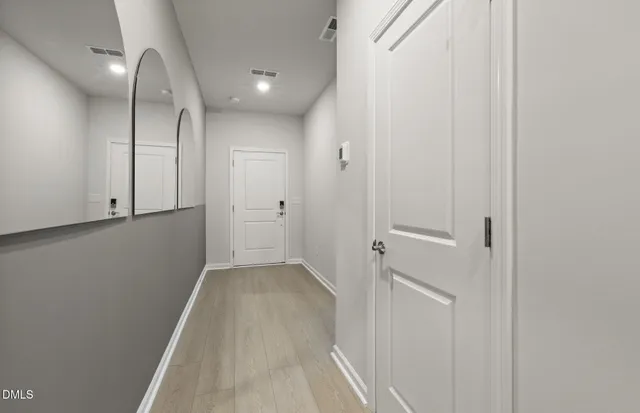 a bathroom with a toilet sink and shower