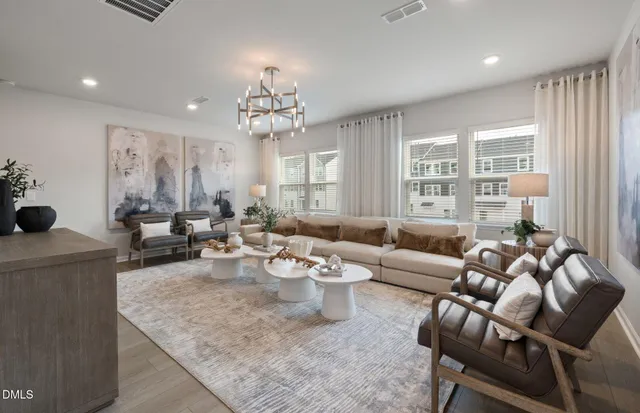 a view of a dining room with furniture and window