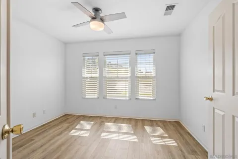 a view of an empty room and window