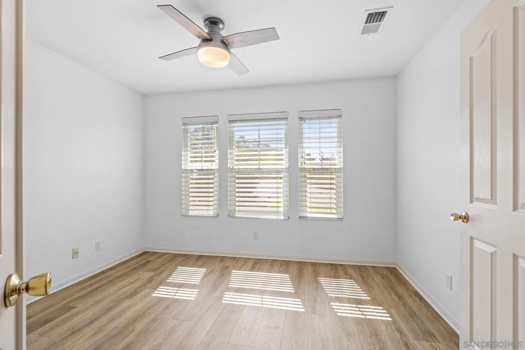2028 Boulders Road Alpine, CA 91901 - Photo 16 of 56 a view of an empty room and window
