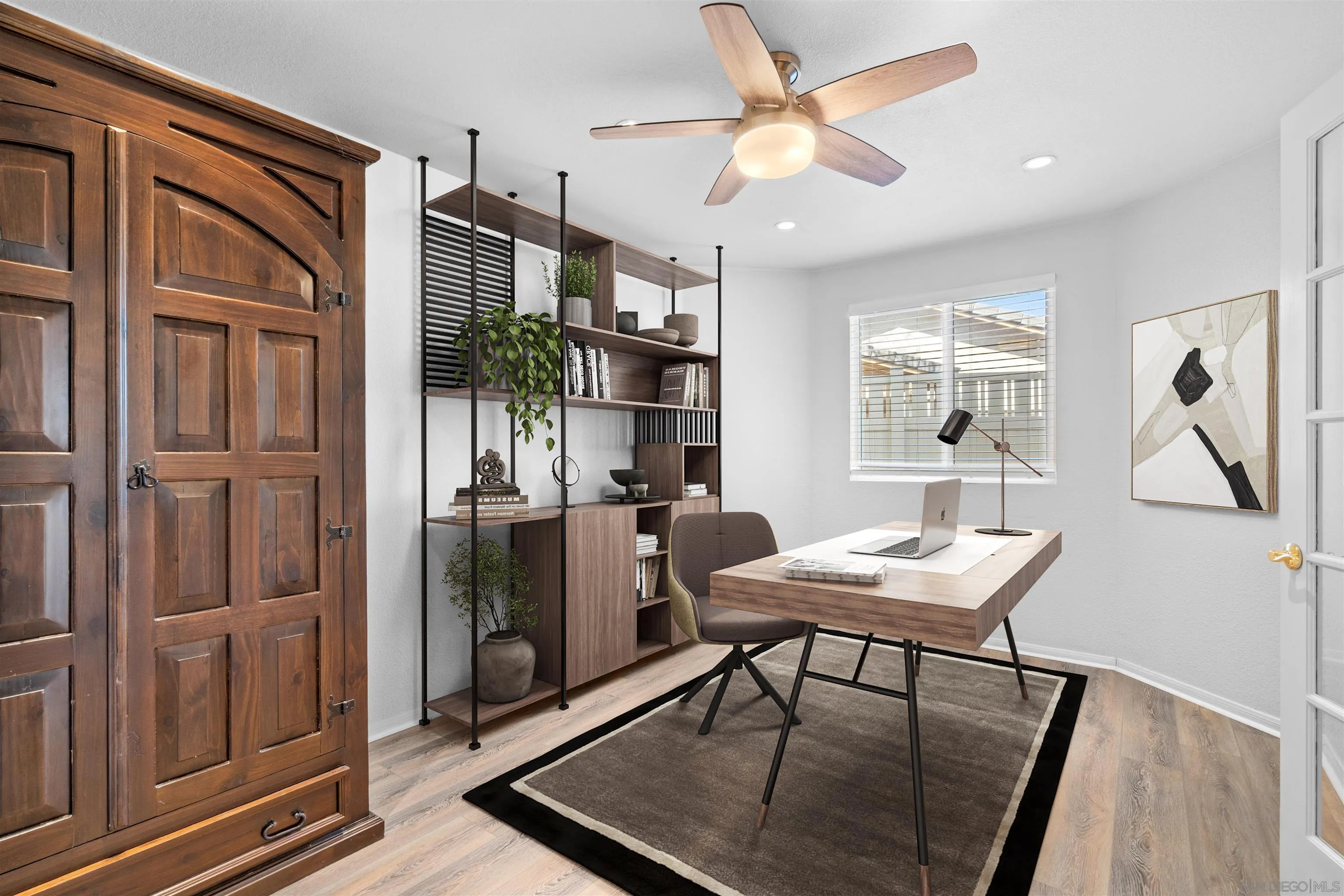 2028 Boulders Road Alpine, CA 91901 - Photo 24 of 56 a view of a livingroom with furniture and a workspace