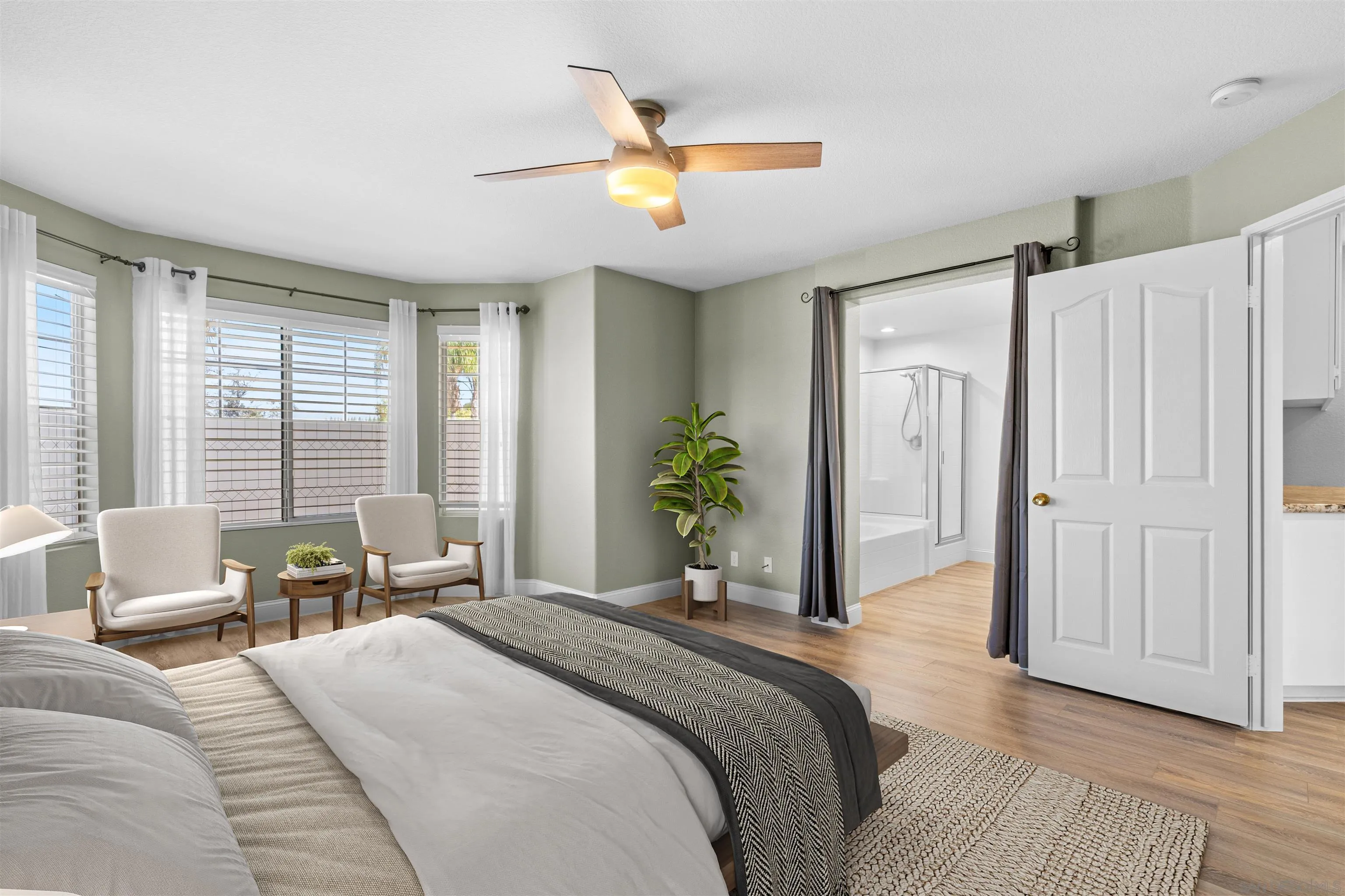 2028 Boulders Road Alpine, CA 91901 - Photo 28 of 56 a bedroom with a bed and a chandelier