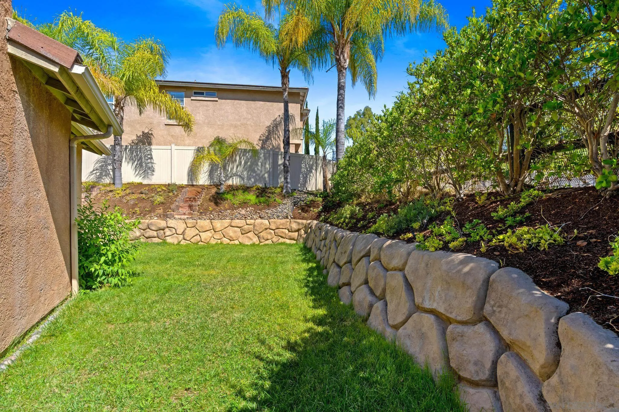 2028 Boulders Road Alpine, CA 91901 - Photo 42 of 56 a view of a yard with plants